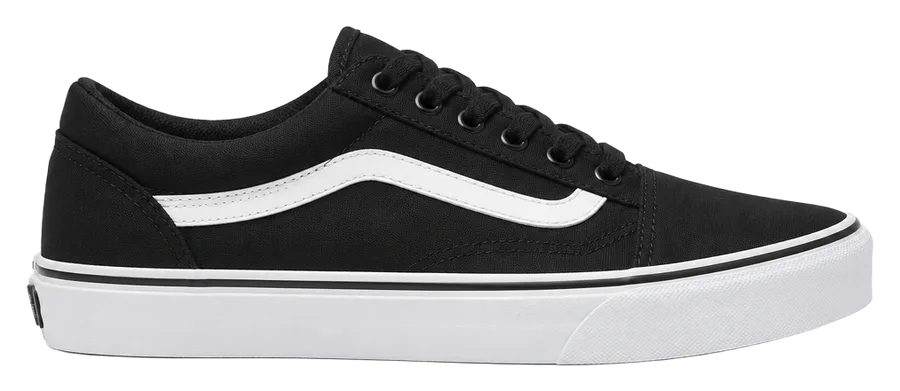 Black canvas low-top sneaker with a white sole and side stripe, side view